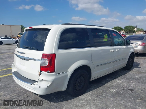 2012 Chrysler Town & Country Touring with VIN 2C4RC1BG9CR251902, listed as a IAAI auction lot 42165738 with 147,218 mi miles. Bid and sale history available at carsss.com. Image 6.