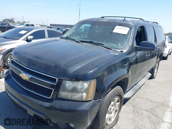 2011 Chevrolet Suburban LT with VIN 1GNSCJE0XBR285973, listed as a IAAI auction lot 42007844 with 252,994 mi miles. Bid and sale history available at carsss.com. Image 2.
