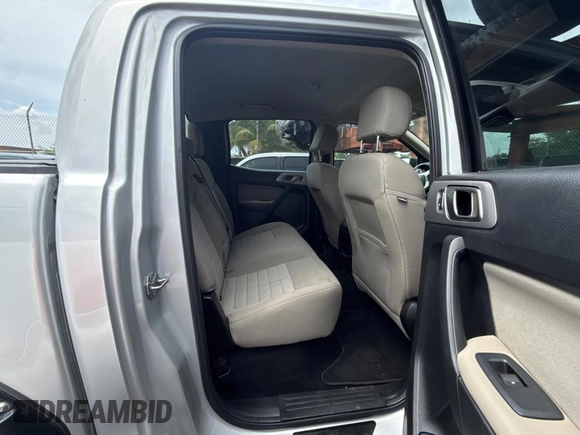 2019 Ford Ranger XL with VIN 1FTER4FH5KLA29401, listed as a Copart auction lot 64990365 with 98,143 mi miles and Salvage title. Bid and sale history available at DreamBid. Image 6.