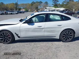 2024 BMW 4 Series M440i with VIN WBA63AW01RFS46965, listed as a IAAI auction lot 41879338 with 12,456 mi miles and . Bid and sale history available at carsss.com. Image 14.