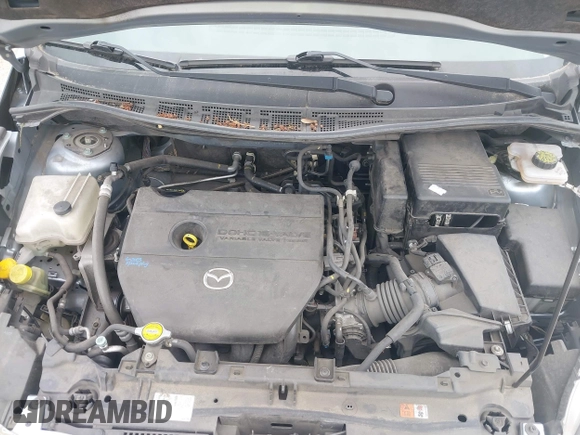 2012 Mazda 5 Sport with VIN JM1CW2BLXC0127258, listed as a IAAI auction lot 42226885 with 112,102 mi miles and . Bid and sale history available at DreamBid. Image 10.