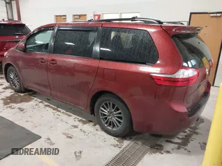 2015 Toyota Sienna LE AAS with VIN 5TDKK3DC8FS655876, listed as a IAAI auction lot 42298949 with 93,459 mi miles and . Bid and sale history available at DreamBid. Image 3.