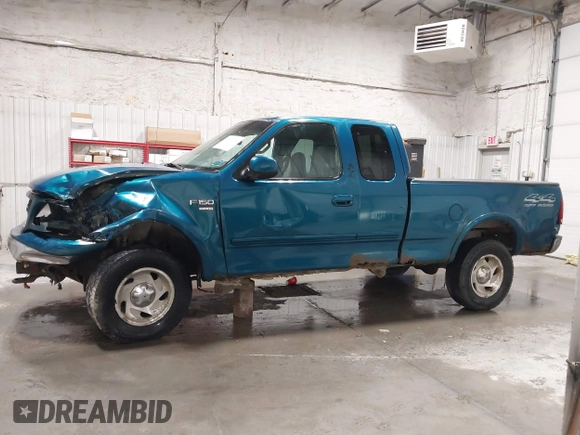2000 Ford F-150 XL z VIN 1FTRX18L7YKB27657, wystawiony jako IAAI lot #42262373 z przebiegiem Nie podano mil oraz . Historia ofert i sprzedaży dostępna na DreamBid. Obrazek 14.