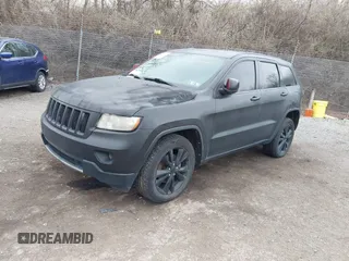 2013 Jeep Grand Cherokee Laredo with VIN 1C4RJEAG2DC573970, listed as a IAAI auction lot 41892914 with 185,050 mi miles. Bid and sale history available at carsss.com. Image 17.