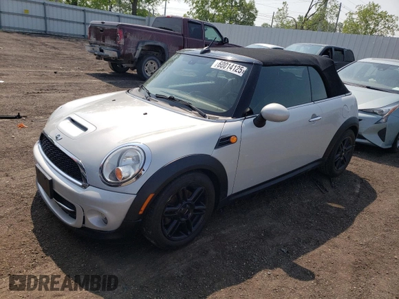 2014 MINI Convertible z VIN WMWZN3C55ET861050, wystawiony jako Copart lot #60014125 z przebiegiem 101 524 mil mil oraz Czysty tytuł • Clean title. Historia ofert i sprzedaży dostępna na DreamBid. Obrazek 1.