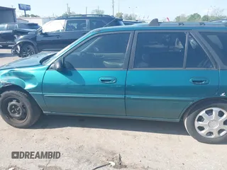 1997 Ford Escort LX z VIN 3FALP15P7VR158272, wystawiony jako IAAI lot #41833216 z przebiegiem 148 170 mil mil oraz . Historia ofert i sprzedaży dostępna na DreamBid. Obrazek 13.