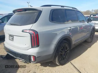 2024 Kia Telluride SX Prestige X-Pro z VIN 5XYP5DGCXRG445215, wystawiony jako IAAI lot #40995272 z przebiegiem 17 931 mil mil oraz . Historia ofert i sprzedaży dostępna na DreamBid. Obrazek 4.