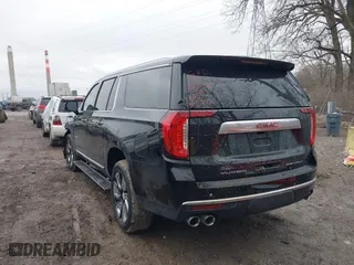 2021 GMC Yukon XL Denali with VIN 1GKS2JKL2MR236297, listed as a IAAI auction lot 41527869 with 53,863 mi miles. Bid and sale history available at carsss.com. Image 3.