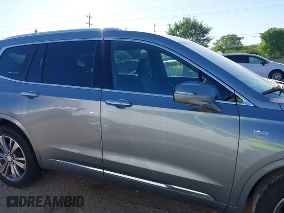 2025 Cadillac XT6 FWD Premium Luxury with VIN 1GYKPCRS3SZ118384, listed as a IAAI auction lot 41962391 with 6,946 mi miles. Bid and sale history available at carsss.com. Image 13.