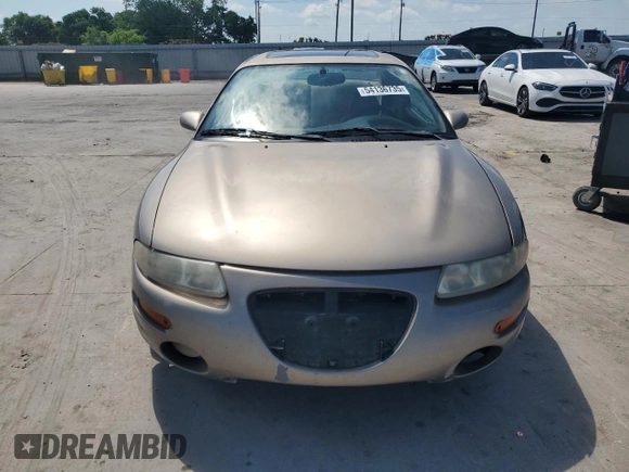 1999 Chrysler Sebring LXi with VIN 4C3AU52N1XE071836, listed as a Copart auction lot 54136735 with 151,531 mi miles and Salvage Title. Bid and sale history available at DreamBid. Image 5.