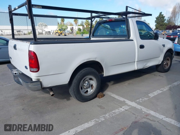 2000 Ford F-150 XL with VIN 1FTRF17WXYKA72880, listed as a IAAI auction lot 41989317 with 149,967 mi miles. Bid and sale history available at carsss.com. Image 4.