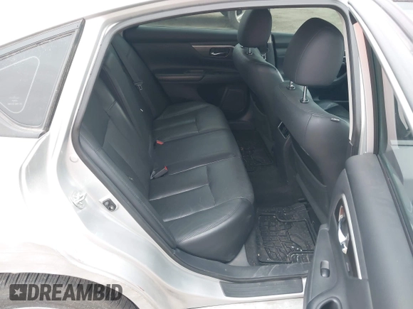2014 Nissan Altima S with VIN 1N4AL3AP2EN257072, listed as a IAAI auction lot 42067633 with 107,446 mi miles and . Bid and sale history available at DreamBid. Image 8.