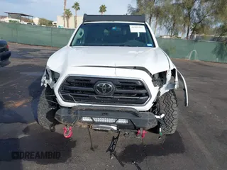 2019 Toyota Tacoma SR z VIN 3TMCZ5AN6KM284101, wystawiony jako IAAI lot #41099466 z przebiegiem 36 119 mil mil oraz . Historia ofert i sprzedaży dostępna na DreamBid. Obrazek 6.