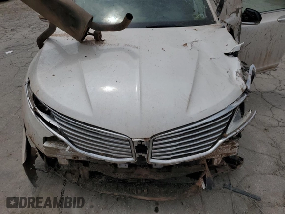 2014 Lincoln MKZ Hybrid с VIN 3LN6L2LU3ER833502, выставлен на аукционе Copart как лот 55996595 с пробегом Не указан миль и Списание • Salvage title. История ставок и продаж доступна на DreamBid. Изображение 11.