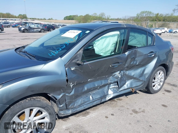 2012 Mazda 3 i Touring z VIN JM1BL1V73C1695634, wystawiony jako IAAI lot #42223477 z przebiegiem 138 302 mil mil oraz . Historia ofert i sprzedaży dostępna na DreamBid. Obrazek 6.