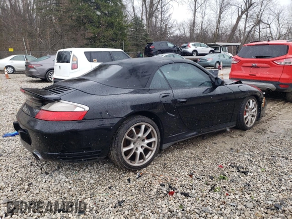 2004 Porsche 911 Carrera S z VIN WP0CB29914S676407, wystawiony jako Copart lot #73391713 z przebiegiem Nie podano mil oraz Szkoda całkowita • Salvage title. Historia ofert i sprzedaży dostępna na DreamBid. Obrazek 3.