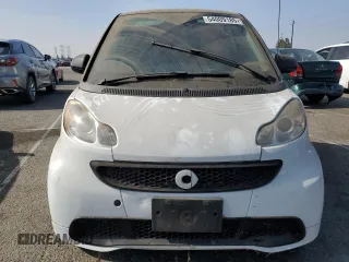 2014 Smart fortwo Pure with VIN WMEEJ3BA3EK780633, listed as a Copart auction lot 54009185 with 104,688 mi miles and Clean Title. Bid and sale history available at DreamBid. Image 5.