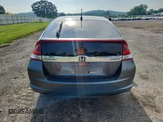 2012 Honda Insight LX with VIN JHMZE2H52CS005731, listed as a Copart auction lot 64077625 with 157,026 mi miles and Non repairable. Bid and sale history available at DreamBid. Image 6.