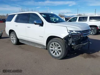 2023 Chevrolet Tahoe Premier with VIN 1GNSKSKDXPR294972, listed as a IAAI auction lot 41648292 with 50,561 mi miles. Bid and sale history available at carsss.com. Image 1.