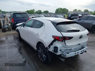 2023 Mazda 3 S Select with VIN JM1BPAKM9P1604211, listed as a IAAI auction lot 42093424 with Not provided miles and . Bid and sale history available at DreamBid. Image 3.