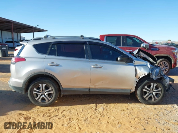 2017 Toyota RAV4 LE with VIN 2T3BFREV2HW672794, listed as a IAAI auction lot 41814820 with 115,721 mi miles and . Bid and sale history available at DreamBid. Image 12.