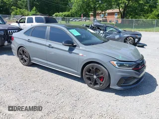 2021 Volkswagen Jetta GLI S with VIN 3VW6T7BU9MM052902, listed as a IAAI auction lot 42286711 with 91,519 mi miles and . Bid and sale history available at DreamBid. Image 1.