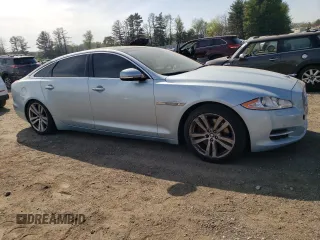 2013 Jaguar XJ Portfolio with VIN SAJWJ2GD3D8V47879, listed as a Copart auction lot 54558195 with 99,500 mi miles and Clean Title. Bid and sale history available at DreamBid. Image 4.