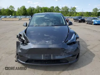 2024 Tesla Model Y Long Range z VIN 7SAYGDEE9RF186388, wystawiony jako Copart lot #58471595 z przebiegiem 23 185 mil mil oraz Szkoda całkowita • Salvage title. Historia ofert i sprzedaży dostępna na DreamBid. Obrazek 5.