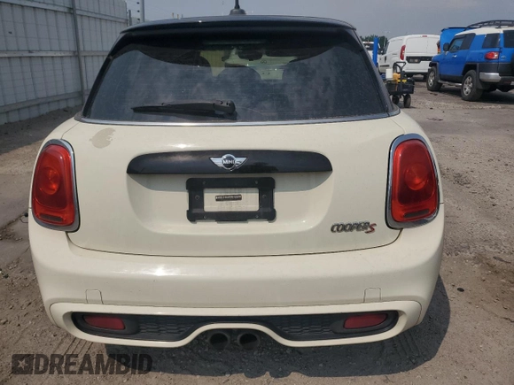 2016 MINI Hardtop 4 Door S with VIN WMWXU3C57G2B63075, listed as a Copart auction lot 63998995 with 71,008 mi miles and Salvage title. Bid and sale history available at DreamBid. Image 6.