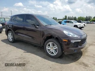 2016 Porsche Cayenne with VIN WP1AA2A24GKA14980, listed as a Copart auction lot 63139115 with 84,671 mi miles and Salvage title. Bid and sale history available at DreamBid. Image 4.