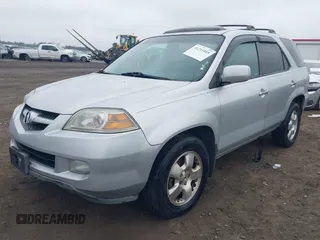 2004 Acura MDX with VIN 2HNYD18244H541101, listed as a IAAI auction lot 41211015 with 226,112 mi miles. Bid and sale history available at carsss.com. Image 17.