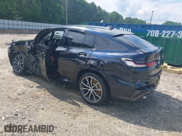 2020 BMW X4 xDrive30i z VIN 5UX2V1C04LLE67552, wystawiony jako IAAI lot #42248462 z przebiegiem 84 531 mil mil oraz . Historia ofert i sprzedaży dostępna na DreamBid. Obrazek 3.