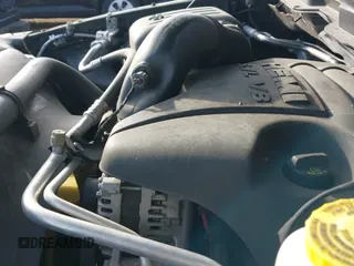 2019 Ram 1500 Tradesman z VIN 1C6RR7KT0KS508822, wystawiony jako IAAI lot #41014684 z przebiegiem 132 825 mil mil oraz . Historia ofert i sprzedaży dostępna na DreamBid. Obrazek 21.