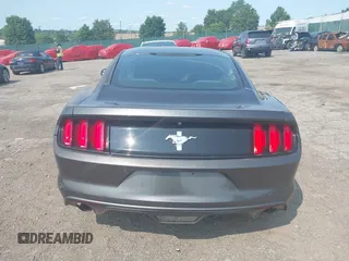 2016 Ford Mustang V6 z VIN 1FA6P8AM7G5320991, wystawiony jako IAAI lot #42405138 z przebiegiem Nie podano mil oraz . Historia ofert i sprzedaży dostępna na DreamBid. Obrazek 15.