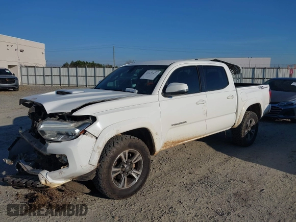 2018 Toyota Tacoma SR5 with VIN 3TMAZ5CN4JM062272, listed as a IAAI auction lot 41671472 with 114,566 mi miles and . Bid and sale history available at DreamBid. Image 6.