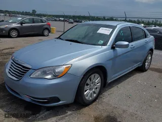 2014 Chrysler 200 LX with VIN 1C3CCBAB2EN124298, listed as a IAAI auction lot 39720604 with 140,752 mi miles. Bid and sale history available at carsss.com. Image 2.