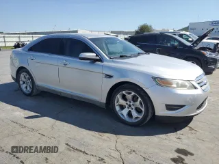 2011 Ford Taurus SEL with VIN 1FAHP2EWXBG175623, listed as a Copart auction lot 68707944 with 185,826 mi miles and Salvage Title. Bid and sale history available at DreamBid. Image 4.