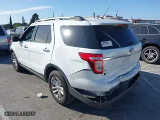 2014 Ford Explorer XLT with VIN 1FM5K7D98EGC24211, listed as a IAAI auction lot 41720341 with 73,903 mi miles. Bid and sale history available at carsss.com. Image 3.