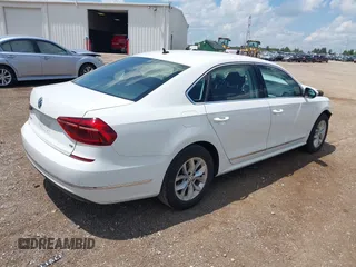 2017 Volkswagen Passat S with VIN 1VWAT7A30HC016932, listed as a IAAI auction lot 42611874 with 100,959 mi miles and . Bid and sale history available at DreamBid. Image 4.