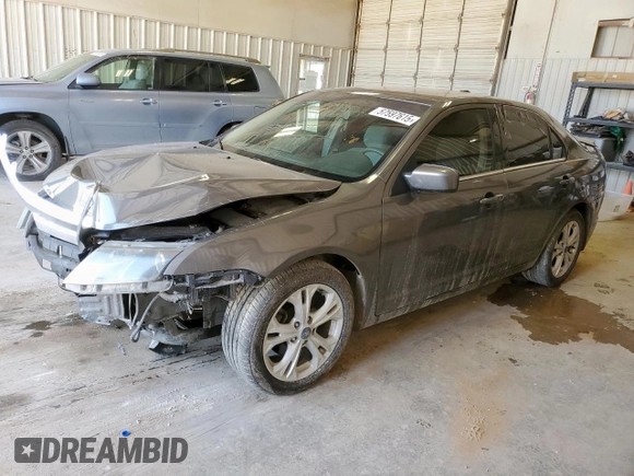 2012 Ford Fusion SE z VIN 3FAHP0HA1CR320160, wystawiony jako Copart lot #57597615 z przebiegiem 142 938 mil mil oraz Szkoda całkowita • Salvage title. Historia ofert i sprzedaży dostępna na DreamBid. Obrazek 1.