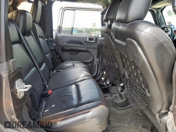 2018 Jeep Wrangler Unlimited Rubicon with VIN 1C4HJXFG6JW166731, listed as a Copart auction lot 56997385 with 117,713 mi miles and Salvage title. Bid and sale history available at DreamBid. Image 10.