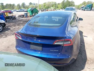 2022 Tesla Model 3 Long Range z VIN 5YJ3E1EB7NF180049, wystawiony jako IAAI lot #42188963 z przebiegiem 18 604 mil mil oraz . Historia ofert i sprzedaży dostępna na DreamBid. Obrazek 16.