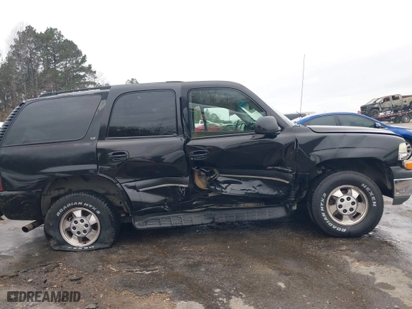 2003 Chevrolet Tahoe LS with VIN 1GNEC13Z73R243308, listed as a IAAI auction lot 41510266 with 246,378 mi miles. Bid and sale history available at carsss.com. Image 6.