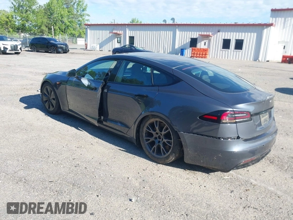 2022 Tesla Model S with VIN 5YJSA1E57NF479056, listed as a IAAI auction lot 42091009 with 78,272 mi miles and . Bid and sale history available at DreamBid. Image 3.