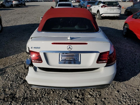 2016 Mercedes-Benz E 400 with VIN WDDKK6FF6GF332670, listed as a Copart auction lot 83417394 with 113,222 mi miles and Salvage Title. Bid and sale history available at carsss.com. Image 6.