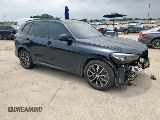 2023 BMW X5 sDrive40i with VIN 5UXCR4C07P9N48328, listed as a Copart auction lot 57619515 with 32,174 mi miles and Salvage title. Bid and sale history available at DreamBid. Image 4.