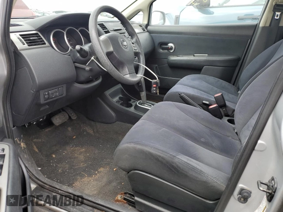 2009 Nissan Versa S with VIN 3N1BC13E79L465505, listed as a Copart auction lot 52097865 with 90,774 mi miles and Salvage Title. Bid and sale history available at DreamBid. Image 7.