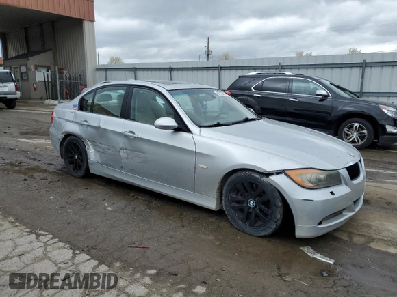 2007 BMW 3 Series 328xi with VIN WBAVC93517KZ71576, listed as a Copart auction lot 53523475 with 185,028 mi miles and Salvage title. Bid and sale history available at DreamBid. Image 4.