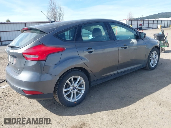 2015 Ford Focus SE with VIN 1FADP3K2XFL306858, listed as a IAAI auction lot 41895767 with 79,566 mi miles. Bid and sale history available at carsss.com. Image 4.