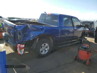 2014 Ram 1500 Outdoorsman with VIN 1C6RR7LT3ES295996, listed as a Copart auction lot 48085655 with 142,968 mi miles and Salvage title. Bid and sale history available at DreamBid. Image 3.